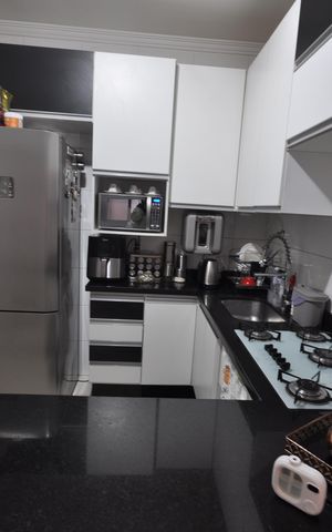Casa à venda com 77m², 2 quartos e 2 vagasCozinha