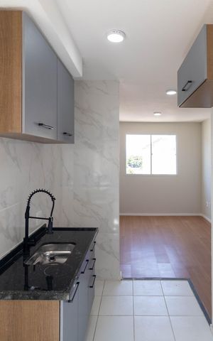 Apartamento à venda com 44m², 2 quartos e 1 vaga Apartamento à venda com 44m², 2 quartos e 1 vagaCozinha e Área de Serviço