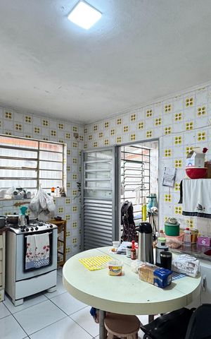 Casa à venda com 160m², 3 quartos e 3 vagas Casa à venda com 160m², 3 quartos e 3 vagasCozinha