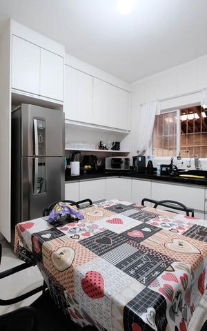 Casa à venda com 309m², 4 quartos e 4 vagasCozinha e Área de Serviço
