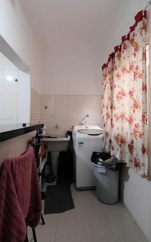 Casa à venda com 309m², 4 quartos e 4 vagasCozinha e Área de Serviço