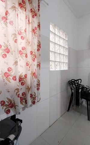 Casa à venda com 309m², 4 quartos e 4 vagasCozinha e Área de Serviço