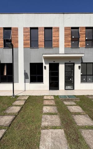 Casa de condomínio à venda com 65m², 2 quartos e 1 vaga Casa de condomínio à venda com 65m², 2 quartos e 1 vagaFachada