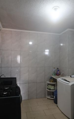 Apartamento à venda com 48m², 2 quartos e 1 vagaCozinha e Área de Serviço