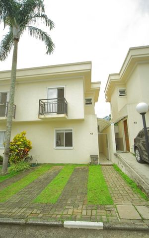 Casa de condomínio para alugar com 123m², 2 quartos e 2 vagasFachada/Garagens 