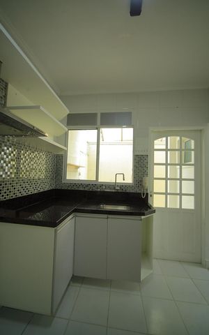 Casa de condomínio para alugar com 123m², 2 quartos e 2 vagasCozinha 