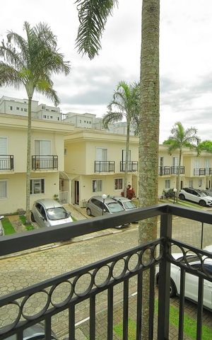 Casa de condomínio para alugar com 123m², 2 quartos e 2 vagasQuarto 1 - Varanda 