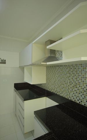 Casa de condomínio para alugar com 123m², 2 quartos e 2 vagasCozinha 
