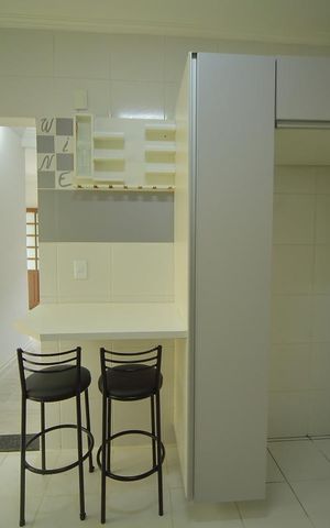 Casa de condomínio para alugar com 123m², 2 quartos e 2 vagasCozinha 