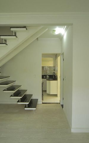 Casa de condomínio para alugar com 123m², 2 quartos e 2 vagasSala