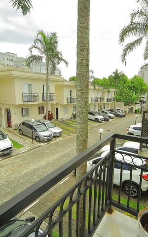 Casa de condomínio para alugar com 123m², 2 quartos e 2 vagasQuarto 1 - Varanda 