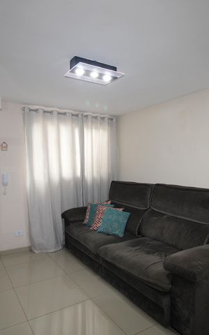 Casa de condomínio para alugar com 110m², 2 quartos e 2 vagasSala