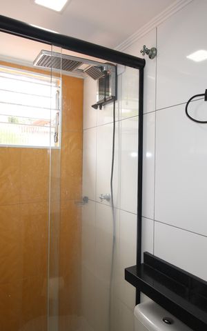 Casa de condomínio para alugar com 110m², 2 quartos e 2 vagasBanheiro da Suíte 1