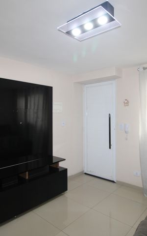 Casa de condomínio para alugar com 110m², 2 quartos e 2 vagasSala