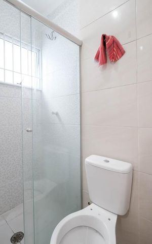 Casa de condomínio à venda com 72m², 2 quartos e 1 vagaSuíte 1