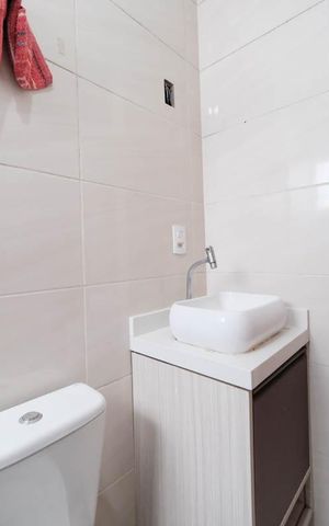Casa de condomínio à venda com 72m², 2 quartos e 1 vagaSuíte 1