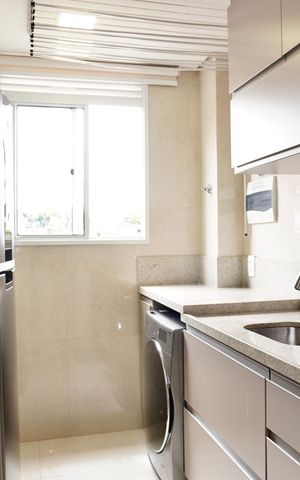 Apartamento à venda com 48m², 2 quartos e 2 vagas Apartamento à venda com 48m², 2 quartos e 2 vagasCozinha e Área de Serviço