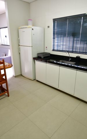 Casa para alugar com 90m², 2 quartos e 2 vagasCozinha