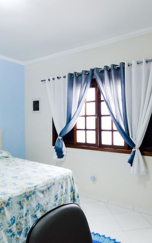 Casa à venda com 110m², 2 quartos e 2 vagasQuarto 1 - Suíte