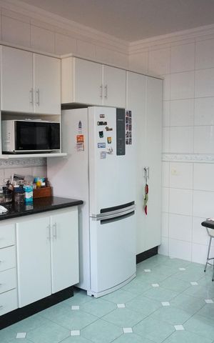 Casa para alugar com 338m², 4 quartos e 4 vagasCozinha