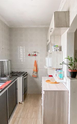 Casa à venda com 147m², 2 quartos e 2 vagas Casa à venda com 147m², 2 quartos e 2 vagasCozinha