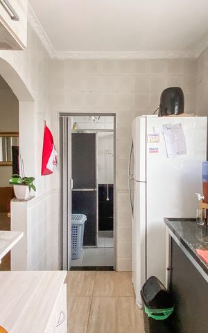 Casa à venda com 147m², 2 quartos e 2 vagas Casa à venda com 147m², 2 quartos e 2 vagasCozinha