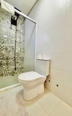 Casa de condomínio à venda com 360m², 4 quartos e 4 vagas Casa de condomínio à venda com 360m², 4 quartos e 4 vagasBanheiro da Suíte 2
