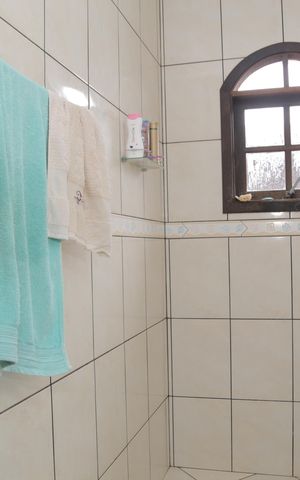 Casa à venda com 220m², 3 quartos e 2 vagas Casa à venda com 220m², 3 quartos e 2 vagasBanheiro da Suíte 1