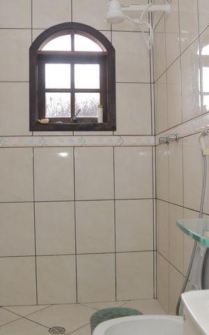 Casa à venda com 220m², 3 quartos e 2 vagas Casa à venda com 220m², 3 quartos e 2 vagasBanheiro da Suíte 1