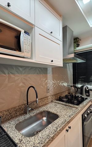 Casa de condomínio à venda com 147m², 4 quartos e 3 vagas Casa de condomínio à venda com 147m², 4 quartos e 3 vagasCozinha