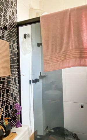 Casa de condomínio à venda com 60m², 2 quartos e 2 vagas Casa de condomínio à venda com 60m², 2 quartos e 2 vagasBanheiro da Suíte 2