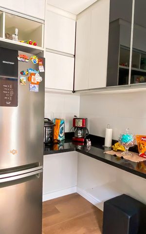 Casa de condomínio à venda com 60m², 2 quartos e 2 vagas Casa de condomínio à venda com 60m², 2 quartos e 2 vagasCozinha