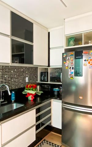 Casa de condomínio à venda com 60m², 2 quartos e 2 vagas Casa de condomínio à venda com 60m², 2 quartos e 2 vagasCozinha