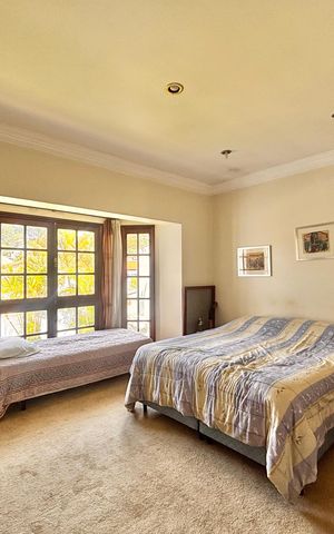 Casa de condomínio à venda com 597m², 5 quartos e 2 vagas Casa de condomínio à venda com 597m², 5 quartos e 2 vagasSuíte 2