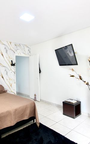 Casa à venda com 125m², 4 quartos e 2 vagas Casa à venda com 125m², 4 quartos e 2 vagasSuite 1