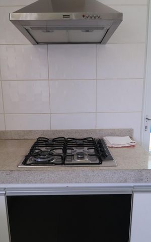 Casa de condomínio para alugar com 350m², 4 quartos e 4 vagasCozinha