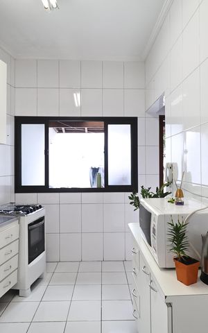 Casa à venda com 170m², 2 quartos e 2 vagas Casa à venda com 170m², 2 quartos e 2 vagasCozinha