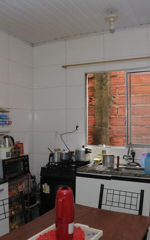 Casa à venda com 60m², 3 quartos e sem vaga Casa à venda com 60m², 3 quartos e sem vagaCozinha