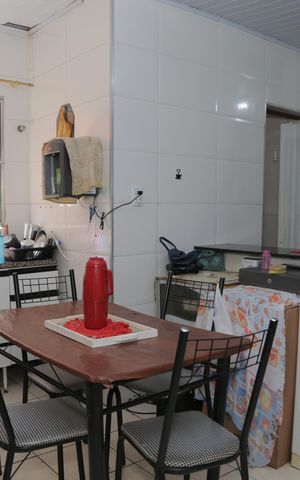 Casa à venda com 60m², 3 quartos e sem vaga Casa à venda com 60m², 3 quartos e sem vagaCozinha