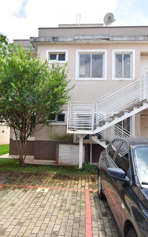 Casa de condomínio à venda com 65m², 2 quartos e 1 vagaFachada