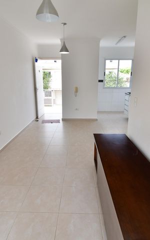 Casa de condomínio à venda com 65m², 2 quartos e 1 vagaSala