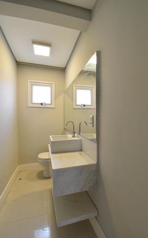 Casa de condomínio para alugar com 411m², 4 quartos e 3 vagasLavabo 2