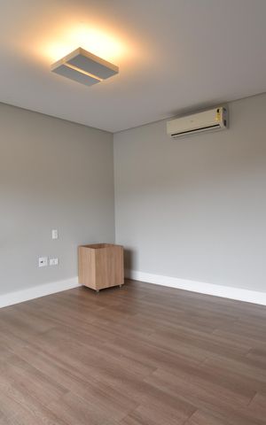 Casa de condomínio para alugar com 411m², 4 quartos e 3 vagasSuíte 1