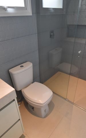 Casa de condomínio para alugar com 411m², 4 quartos e 3 vagasBanheiro Suíte 2