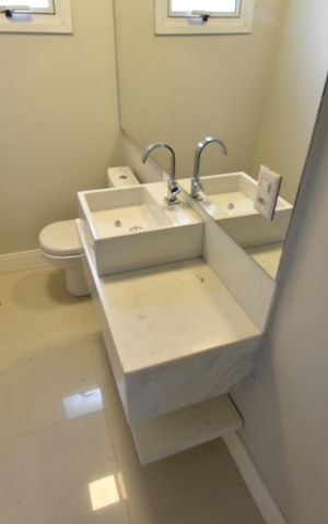 Casa de condomínio para alugar com 411m², 4 quartos e 3 vagasLavabo 2
