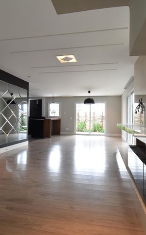 Casa de condomínio para alugar com 411m², 4 quartos e 3 vagasSala 1