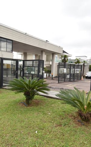 Casa de condomínio para alugar com 411m², 4 quartos e 3 vagasFachada do condomínio