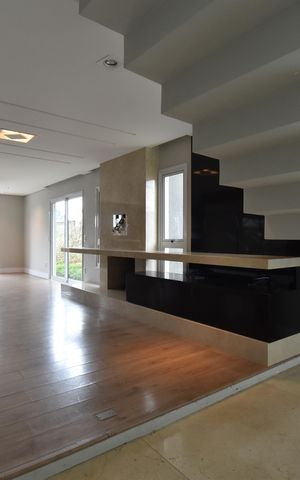 Casa de condomínio para alugar com 411m², 4 quartos e 3 vagasSala 1