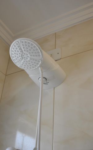 Casa de condomínio à venda com 60m², 2 quartos e 2 vagasBanheiro da Suíte 2