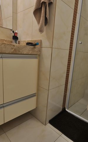 Casa de condomínio à venda com 60m², 2 quartos e 2 vagasBanheiro da Suíte 1
